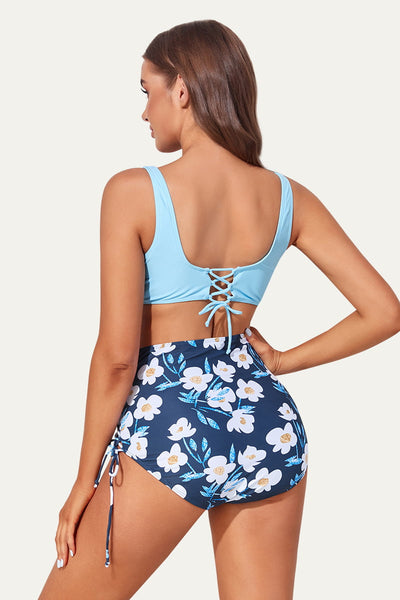 two-piece-twist-front-deep-v-neck-maternity-swimsuit-with-adjustable-side-tie-bottom#color_blue-cutie-frangipani