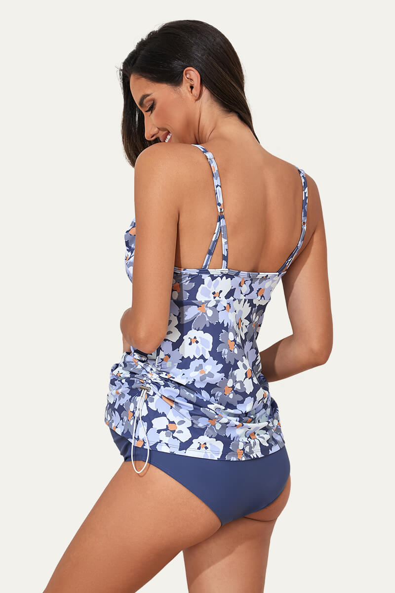 two-piece-v-neck-ruffle-front-maternity-tankini-dress#color_dewdrop-blooms-denim-blue